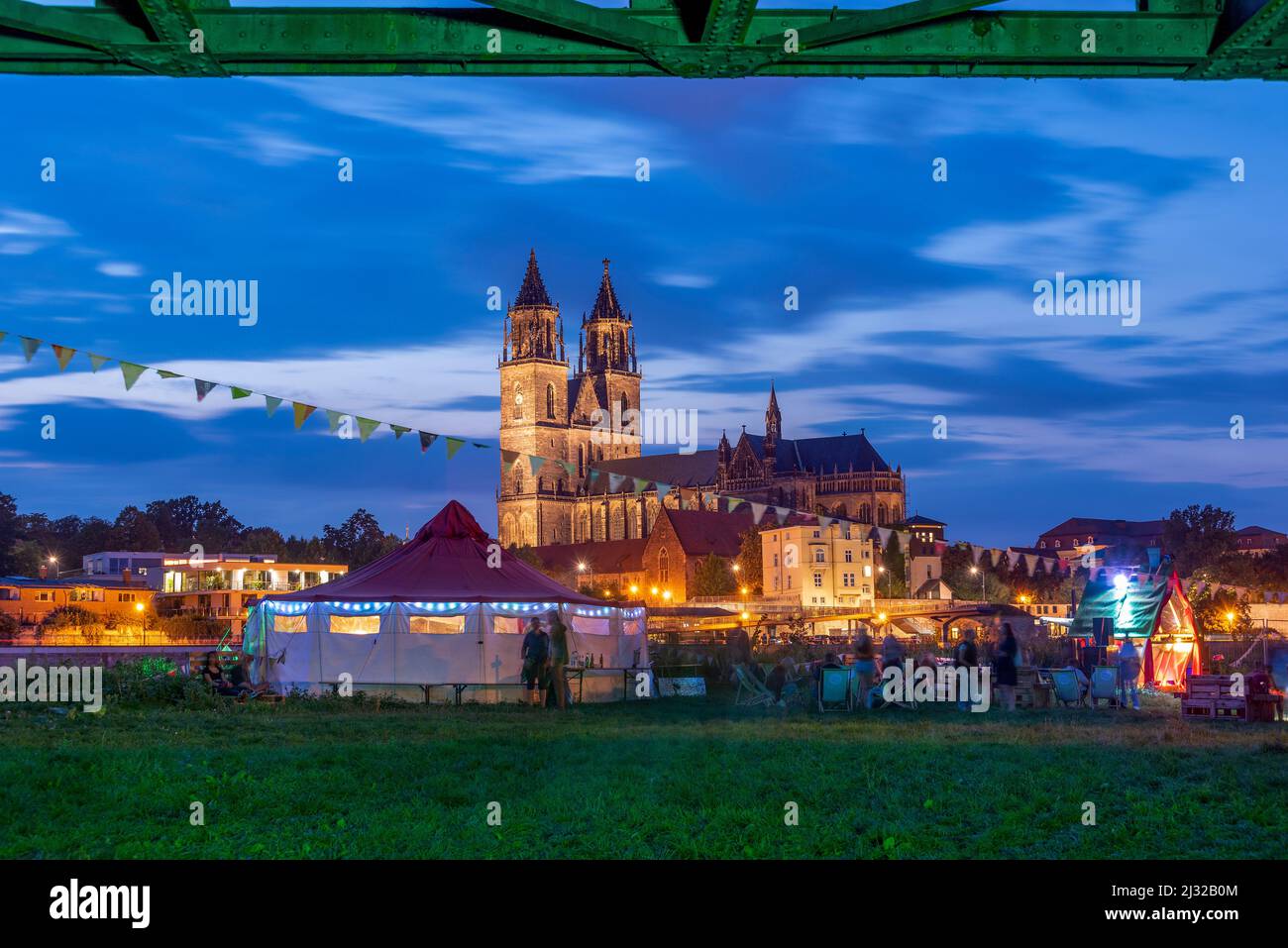 Party tent on the Elbe, behind it Magdeburg Cathedral, Saxony-Anhalt, Germany Stock Photo