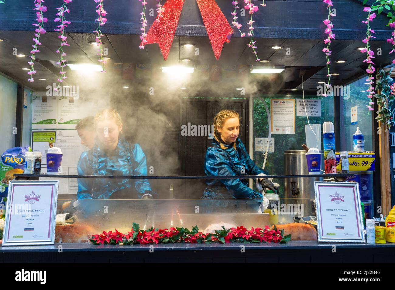 Food stall at the Christmas market in Worcester, UK 2022 Stock Photo