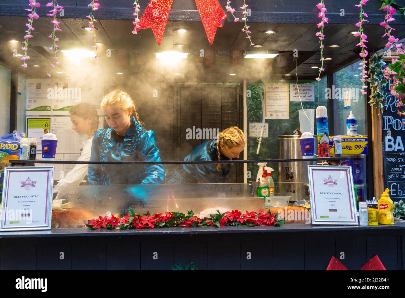 Food stall at the Christmas market in Worcester, UK 2022 Stock Photo