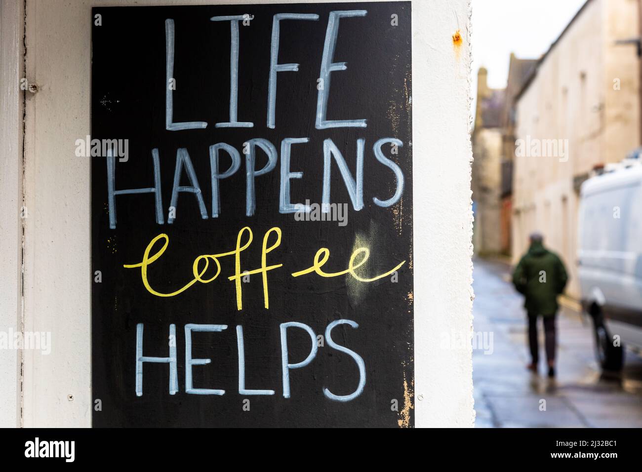 Coffee shop notice saying life happens coffee helps Stock Photo