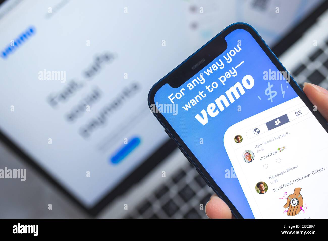 Woman use Venmo app. Mobile phone banking and investment concept  Stock Photo