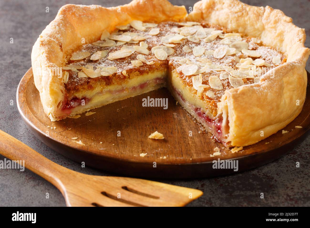 English dessert Bakewell Pudding cake with raspberry jam and filling of