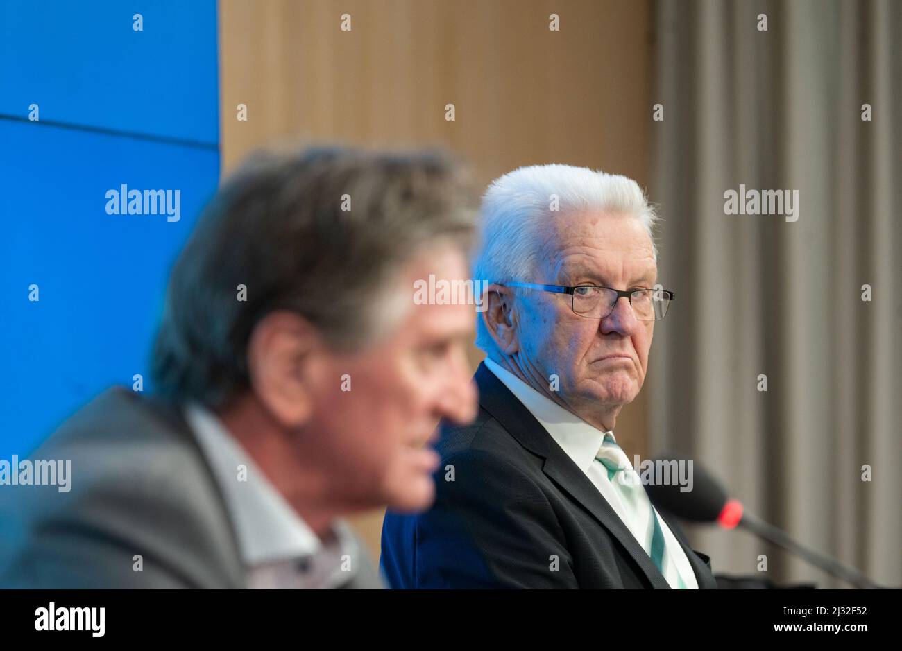 Stuttgart, Germany. 05th Apr, 2022. Manfred Lucha (Bündnis 90/Die Grünen, l), Minister for Social Affairs, Health and Integration in Baden-Württemberg, and Winfried Kretschmann (Bündnis 90/Die Grünen), Minister President of Baden-Württemberg, attend a government press conference in the Citizens' and Media Center of the Baden-Württemberg state parliament. The FDP and SPD want to push through the dismissal of Health Minister Lucha in the state parliament. Credit: Marijan Murat/dpa/Alamy Live News Stock Photo