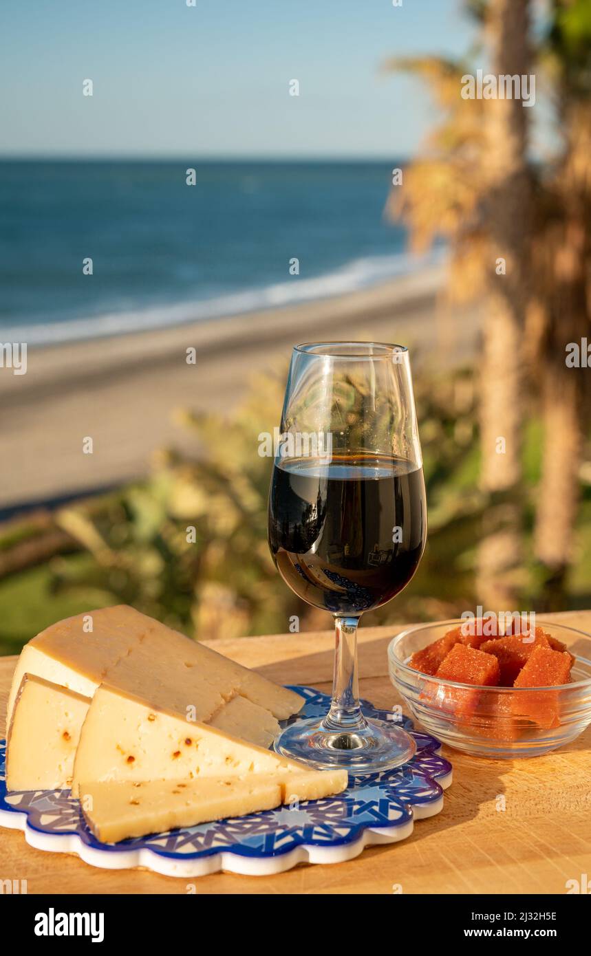 Tasting of sweet Spanish fortified Pedro Ximenez sherry wine with