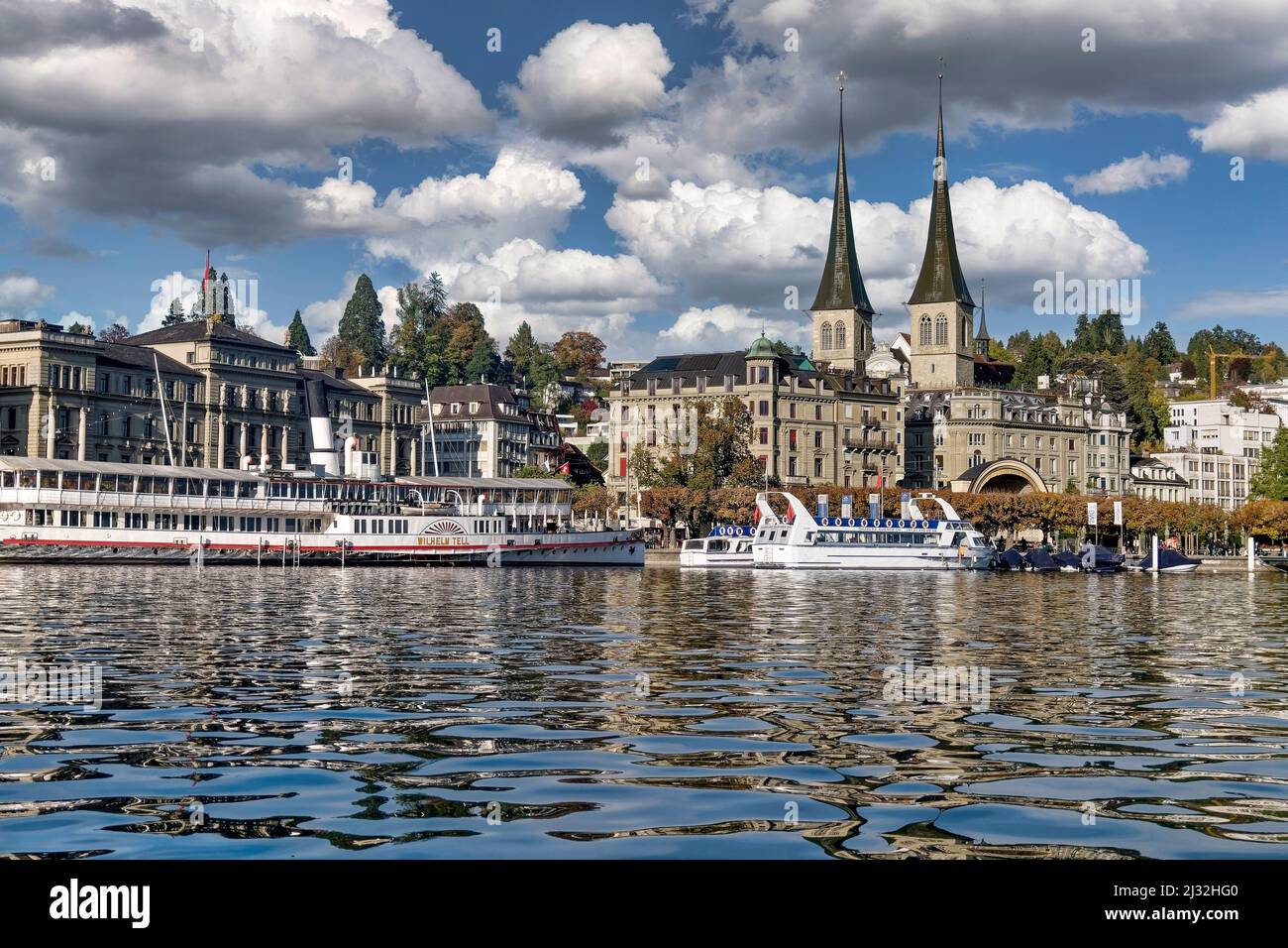 Lucerne in autumn, Lake Lucerne, Wilhelm Tell paddle steamer, Katholische Hofkirche St. Leodegar, Switzerland Stock Photo