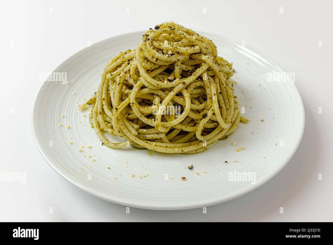 basil pesto pasta on a white background Stock Photo