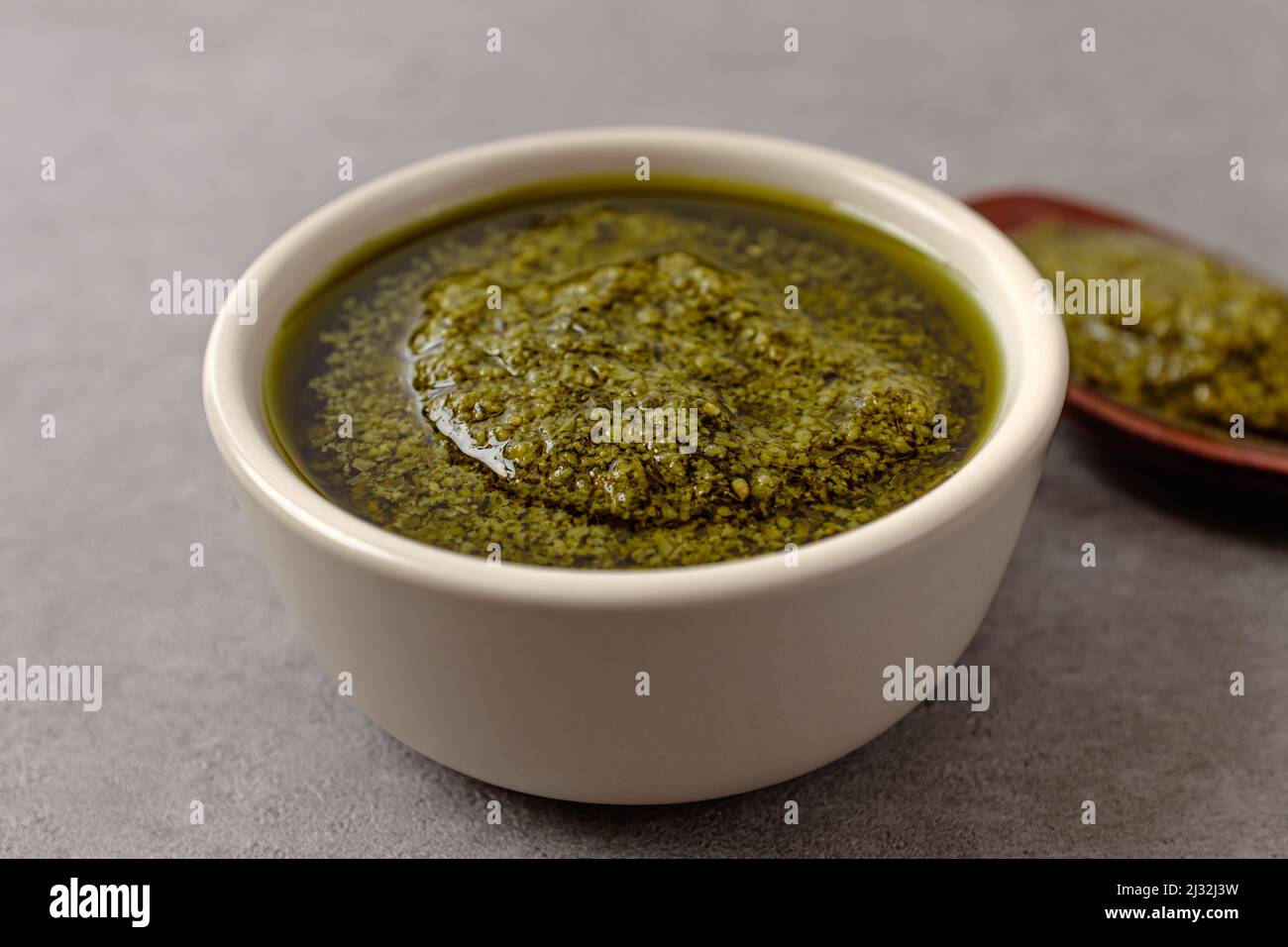 Pesto with basil, olive oil, pine nuts and cheese Basil Pesto Stock Photo Alamy