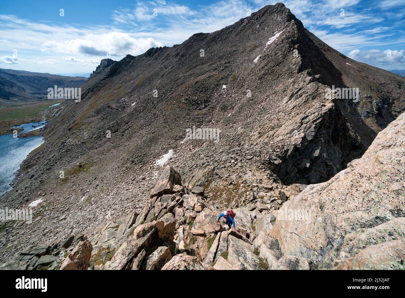 Climbing Mt. Evans with Mt. Bierstadt in the background, Colorado, USA Stock Photo