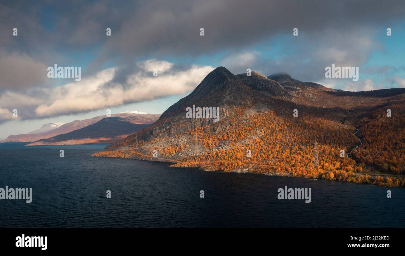 Landscape with mountains and lake in Stora Sjöfallet National Park in autumn in Lapland in Sweden from above Stock Photo