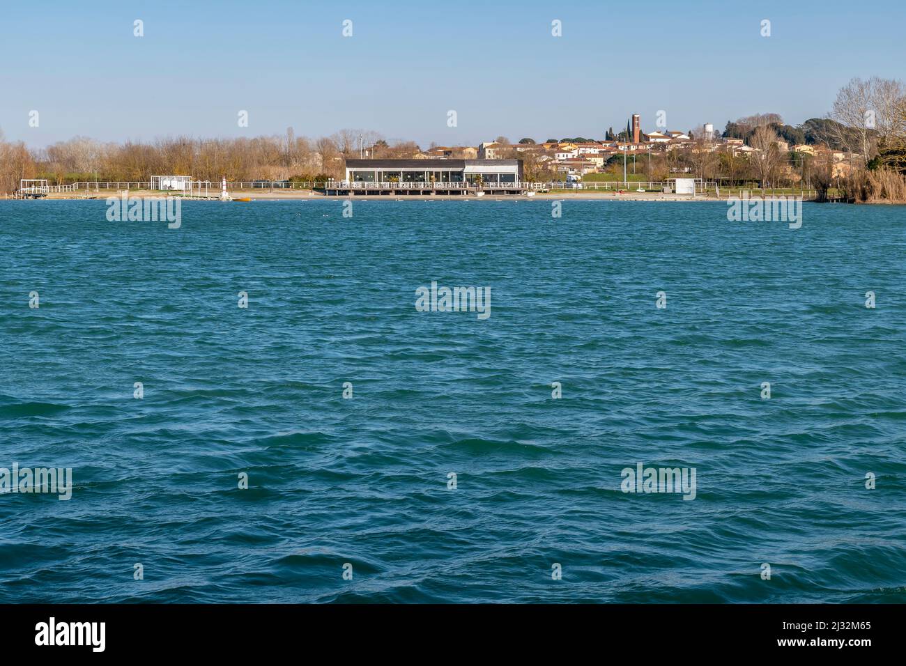 Braccini lakes with La Rotta in the background, Pontedera, Italy, on a sunny day Stock Photo