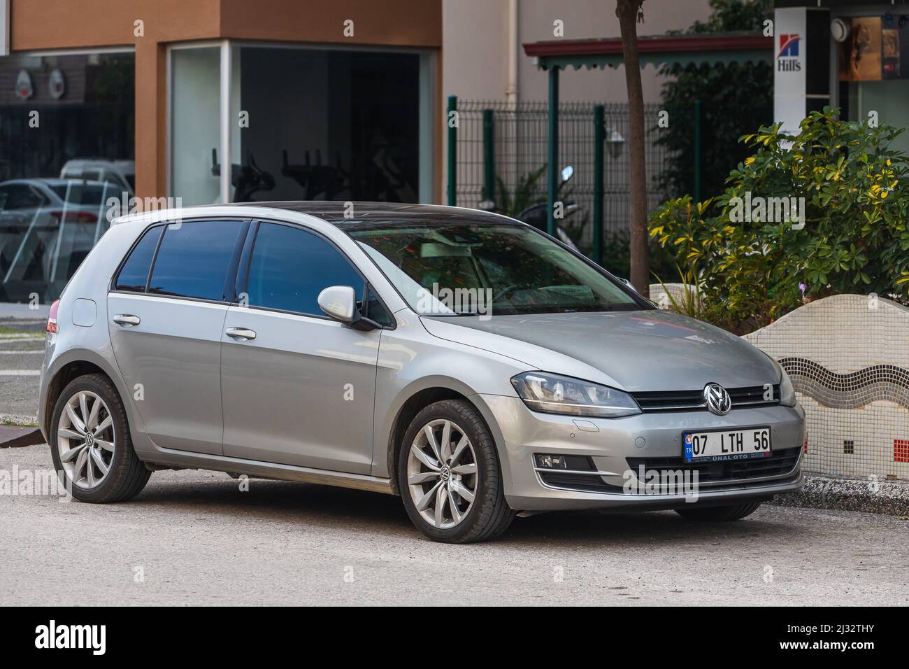 Side; Turkey – March 03 2022:    silver   Volkswagen Golf  is parked  on the street on a summer day Stock Photo