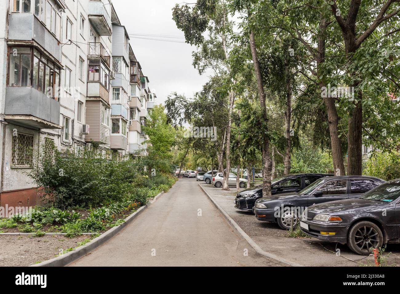 Courtyard of Khrushchyovka, common type of old lowcost apartment building in Russia and post