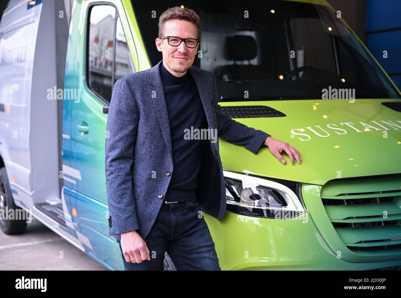 Stuttgart, Germany. 05th Apr, 2022. Mathias Geisen, Head of the Van  Division at Mercedes-Benz, stands by a Mercedes Sprinter Sustaineer. The  electric vehicle, which has solar panels and air filters installed, is