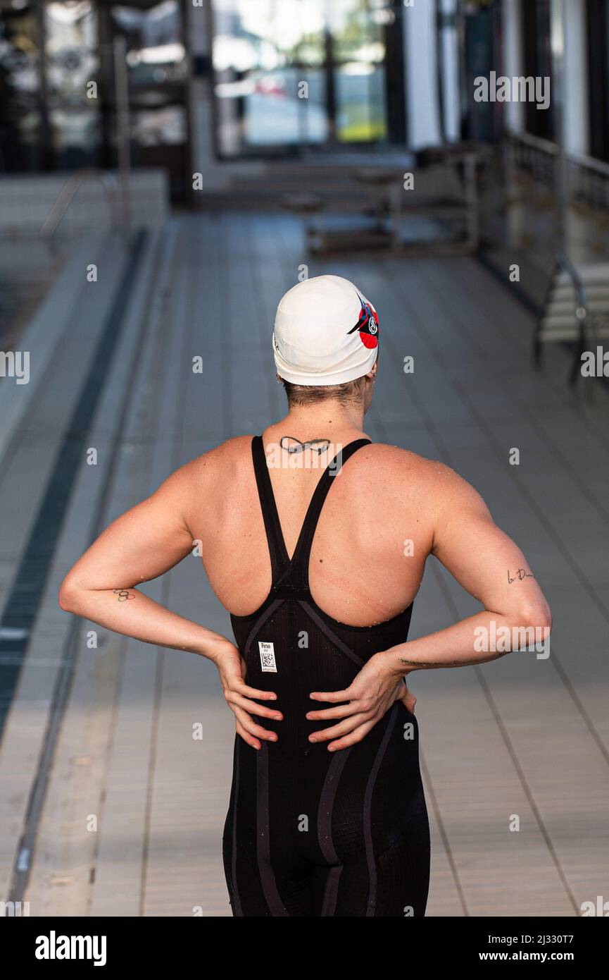 March 22, 2022, Marseille, France: French swimmer who won a bronze medal in 50 m butterfly Melanie Henique seen at the edge of the pool during her training. Tony Estanguet, a member of the IOC (International Olympic Committee) and the organizing committee of the Olympic Games Paris 2024 is visiting Marseille. He met the athletes of the swimming club Cercle des Nageurs de Marseille. The city of Marseille will organize an important part of the nautical events of Paris 2024. (Credit Image: © Laurent Coust/SOPA Images via ZUMA Press Wire) Stock Photo