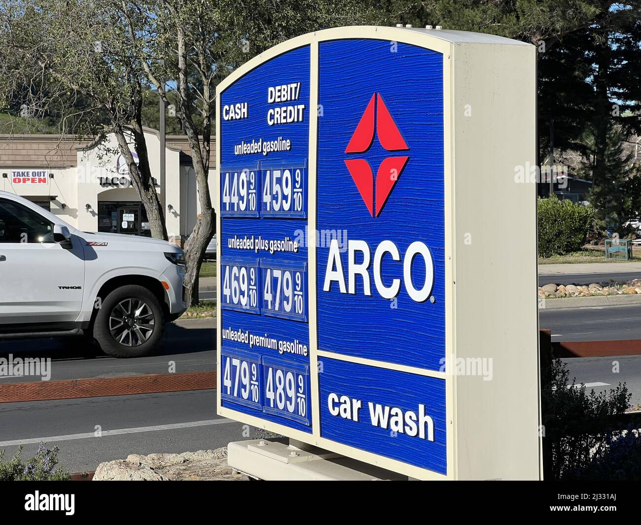 Sign with gas prices for Arco gas station in Moraga, California