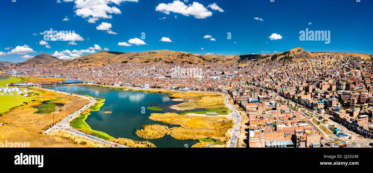 Aerial panorama of Puno with Lake Titicaca in Peru, South America Stock Photo