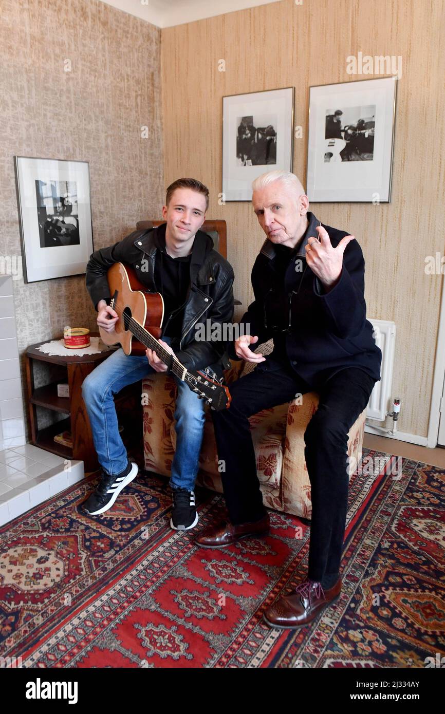 EDITORIAL USE ONLY Mike McCartney, brother of Sir Paul McCartney, and musician, Louis Atherton, inside 20 Forthlin Road in Liverpool, their childhood home, launch 'The Forthlin Sessions' by the National Trust, a scheme giving unsigned musicians the chance to visit, write, and perform at 'The Birthplace of the Beatles'. Picture date: Tuesday April 5, 2022. Stock Photo