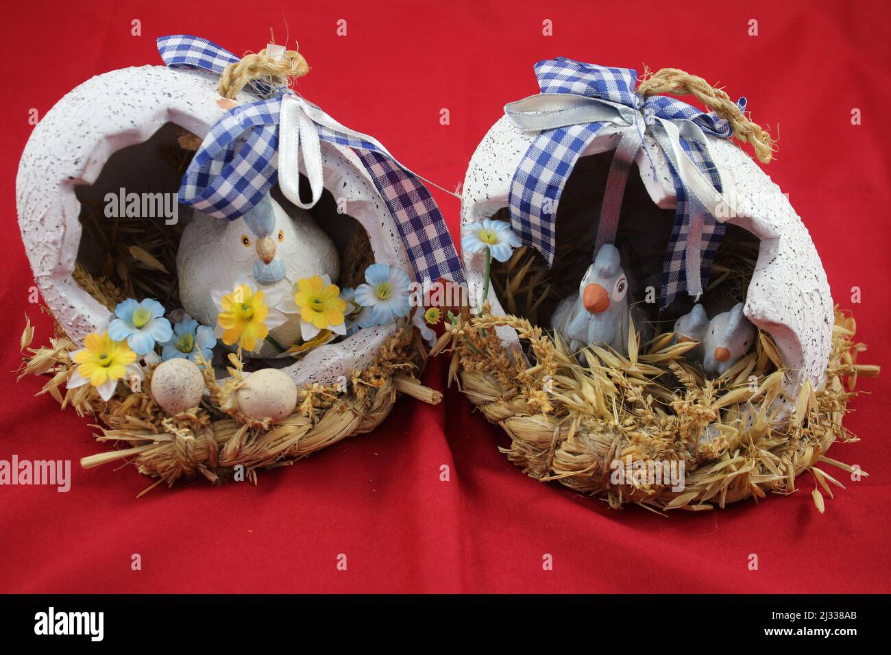Easter decorations. Easter eggs. Coloured eggs. Decorated eggs. Eggshell with chicken inside. Resurrection celebration. Spring event. Religious. Stock Photo