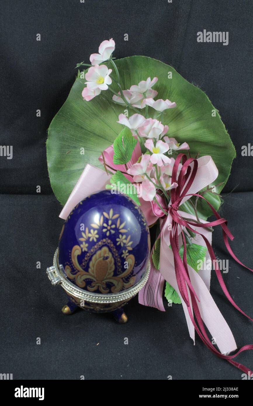 Easter decorations. Easter eggs. Coloured eggs. Decorated eggs. Eggshell with chicken inside. Resurrection celebration. Spring event. Religious. Stock Photo