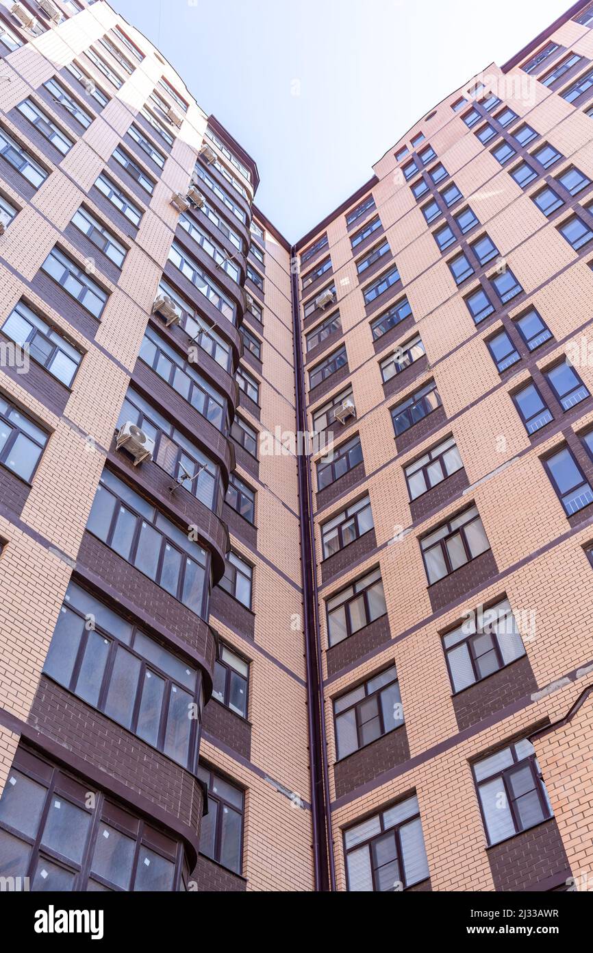 New multiapartment highrise buildings made of brick. Apartments with