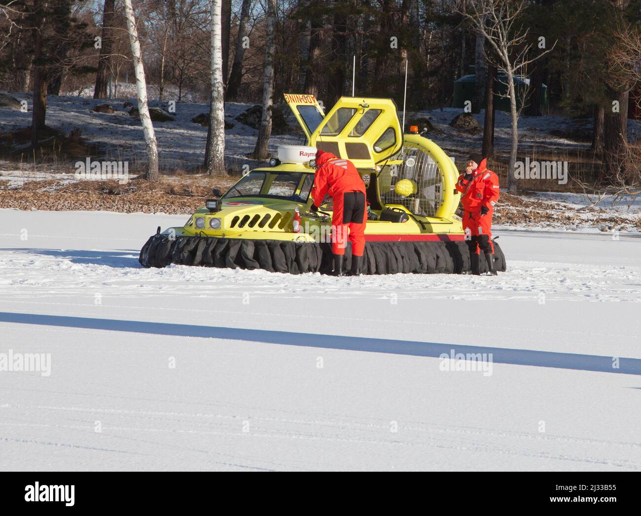 HOVERCRAFT from Swedish sea rescue society have a coffebreak on the ice of lake Hjälmaren in Södermanland Sweden Stock Photo