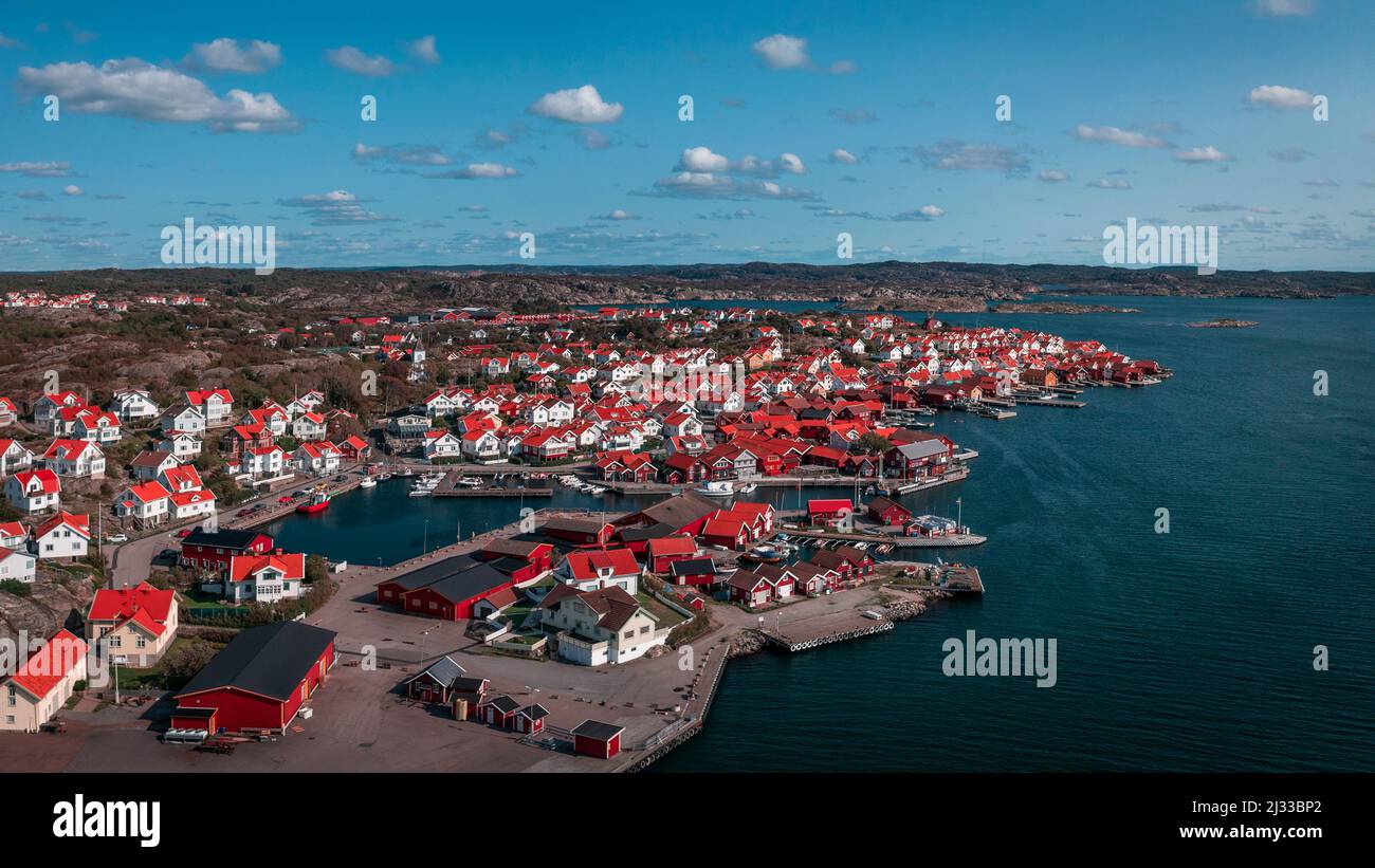 Coast and village of Mollösund on the archipelago island of Orust on the west coast of Sweden from above, sunshine on the day with a blue sky Stock Photo