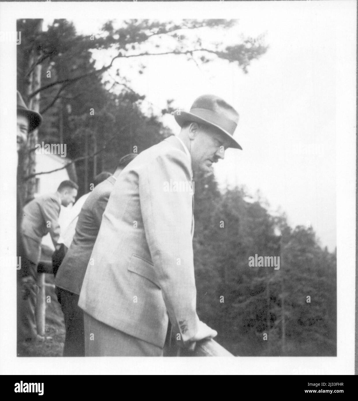 Besuch Gauleiter Wagner 1936. Eva Braun's Photo Albums, ca. 1913 - ca. 1944. These albums are attributed to Eva Braun (four are claimed by her friend Herta Schneider, nee Ostermeyer) and document her life from ca. 1913 to 1944. There are many photographs of Eva, her sisters and their children, Herta Schneider and her children, as well as photographs of Eva's vacations, family members and friends. Included also are photographs taken by and of Eva Braun at Hitler's chalet Berghof (or Kehlstein), photographs of Hitler and his entourage, visitors to Berghof and the scenery around Berchtesgaden, an Stock Photo