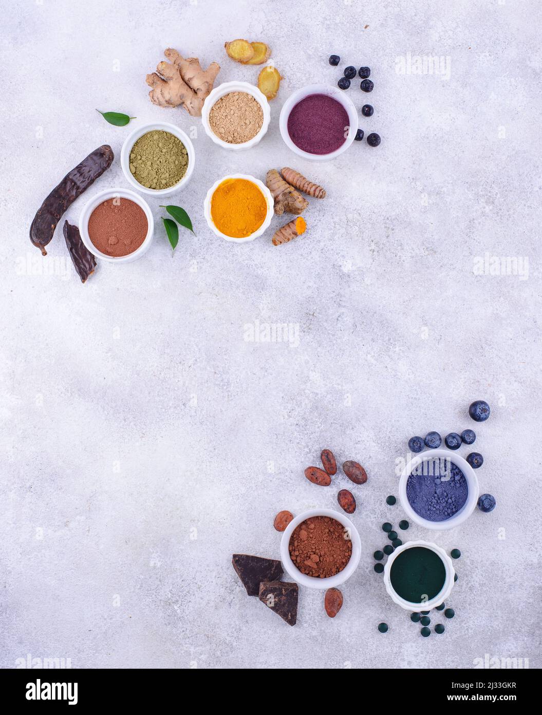 Various healthy superfoods powder Stock Photo - Alamy