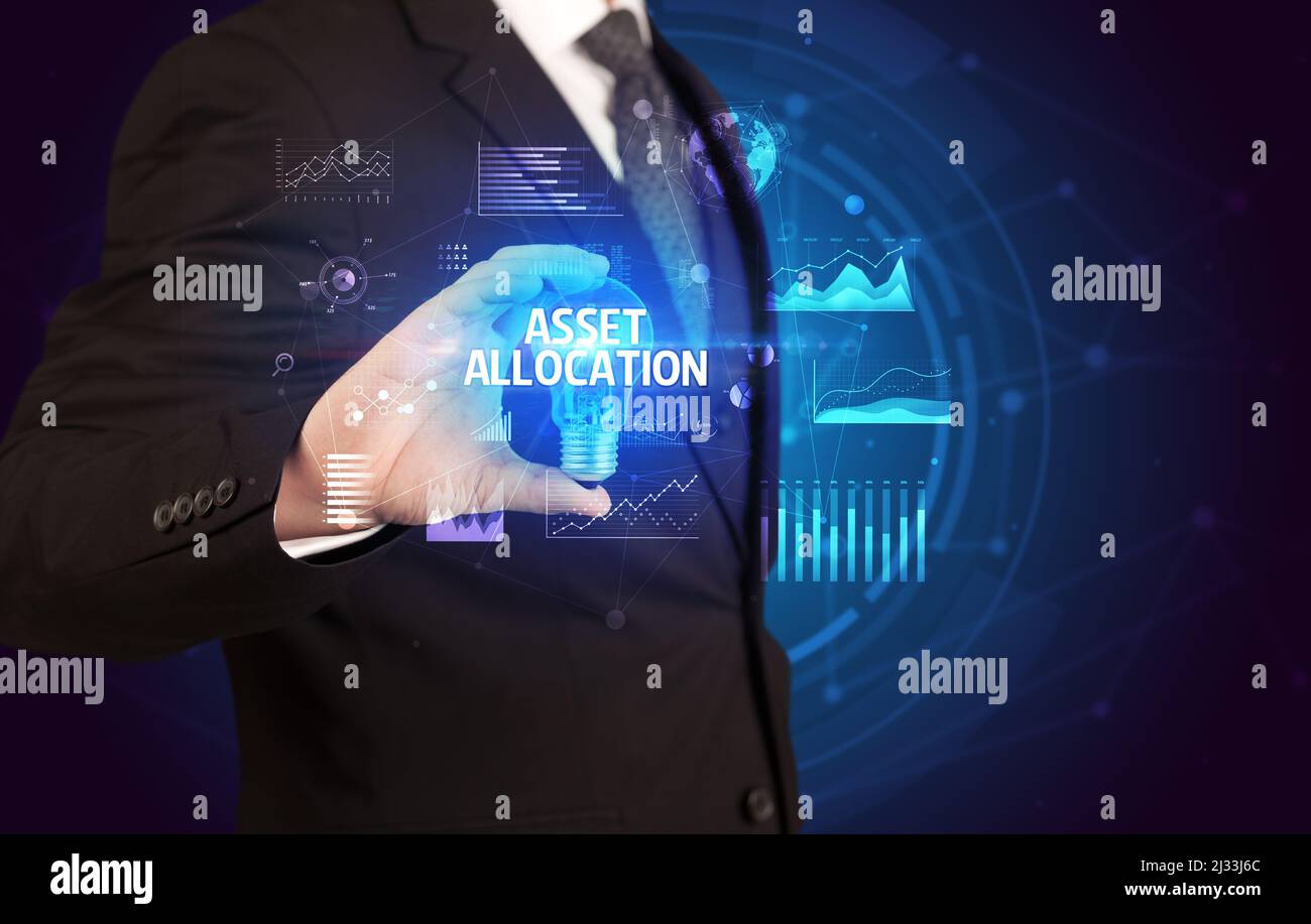 Businessman holding a light bulb, new business concept Stock Photo - Alamy