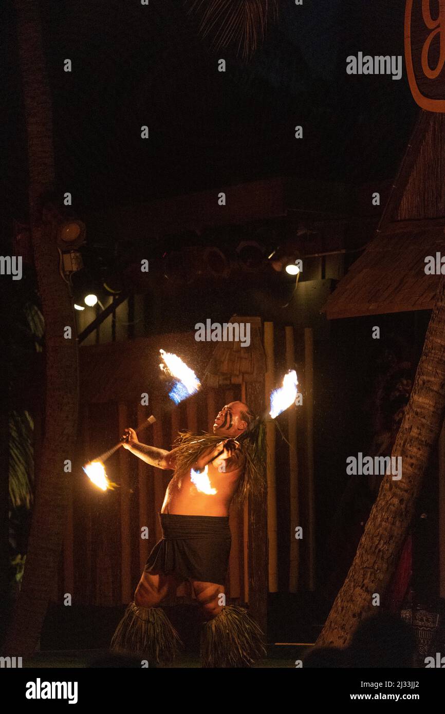 Fire dancer at traditional Hawaiian luau Stock Photo