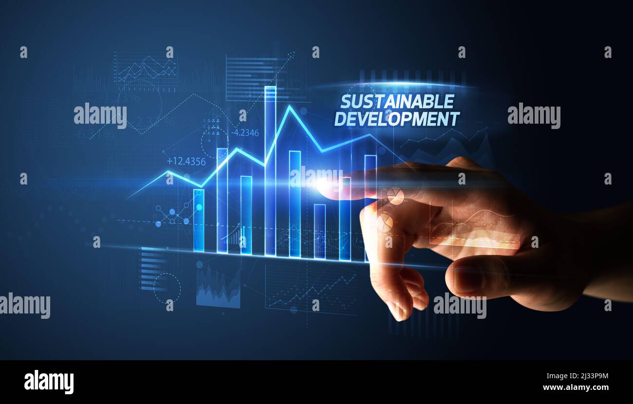 Hand touching SUSTAINABLE DEVELOPMENT button, business concept Stock ...