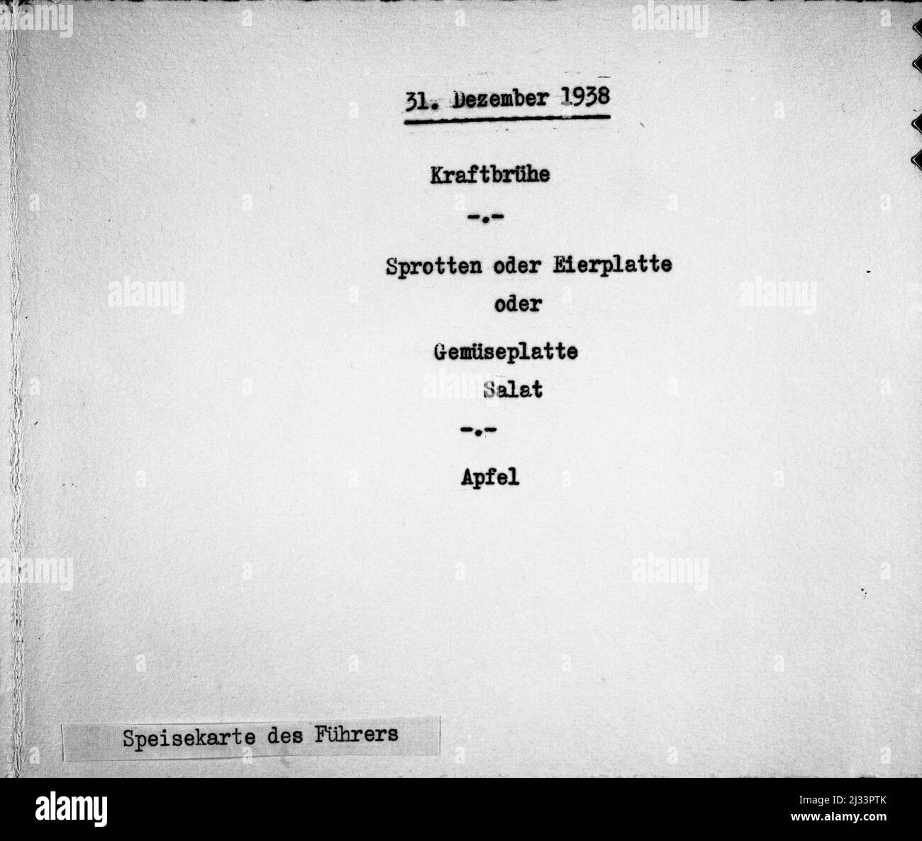 31. Dezember 1938KraftbrüheSprotten oder EierplatteroderGemuseplatterSalatApfelSpeisekarte des Führers -  31. December 1938ConsomméSprats or Egg PlatterorVegetable PlatterSaladAppleMenu of the Führer. Eva Braun's Photo Albums, ca. 1913 - ca. 1944. These albums are attributed to Eva Braun (four are claimed by her friend Herta Schneider, nee Ostermeyer) and document her life from ca. 1913 to 1944. There are many photographs of Eva, her sisters and their children, Herta Schneider and her children, as well as photographs of Eva's vacations, family members and friends. Included also are photographs Stock Photo