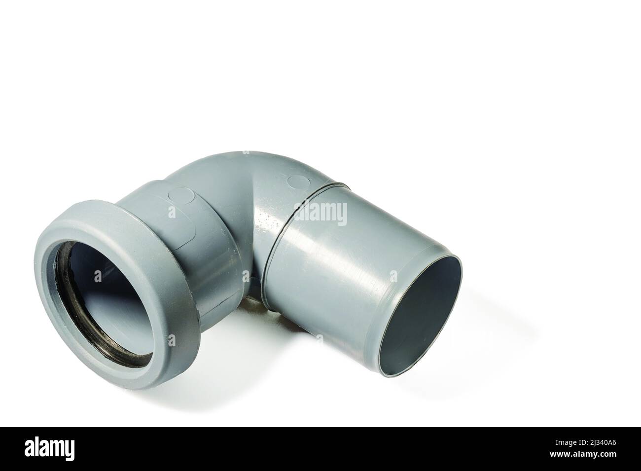 Close up view of plumbing corner piece of plastic pipe isolated on