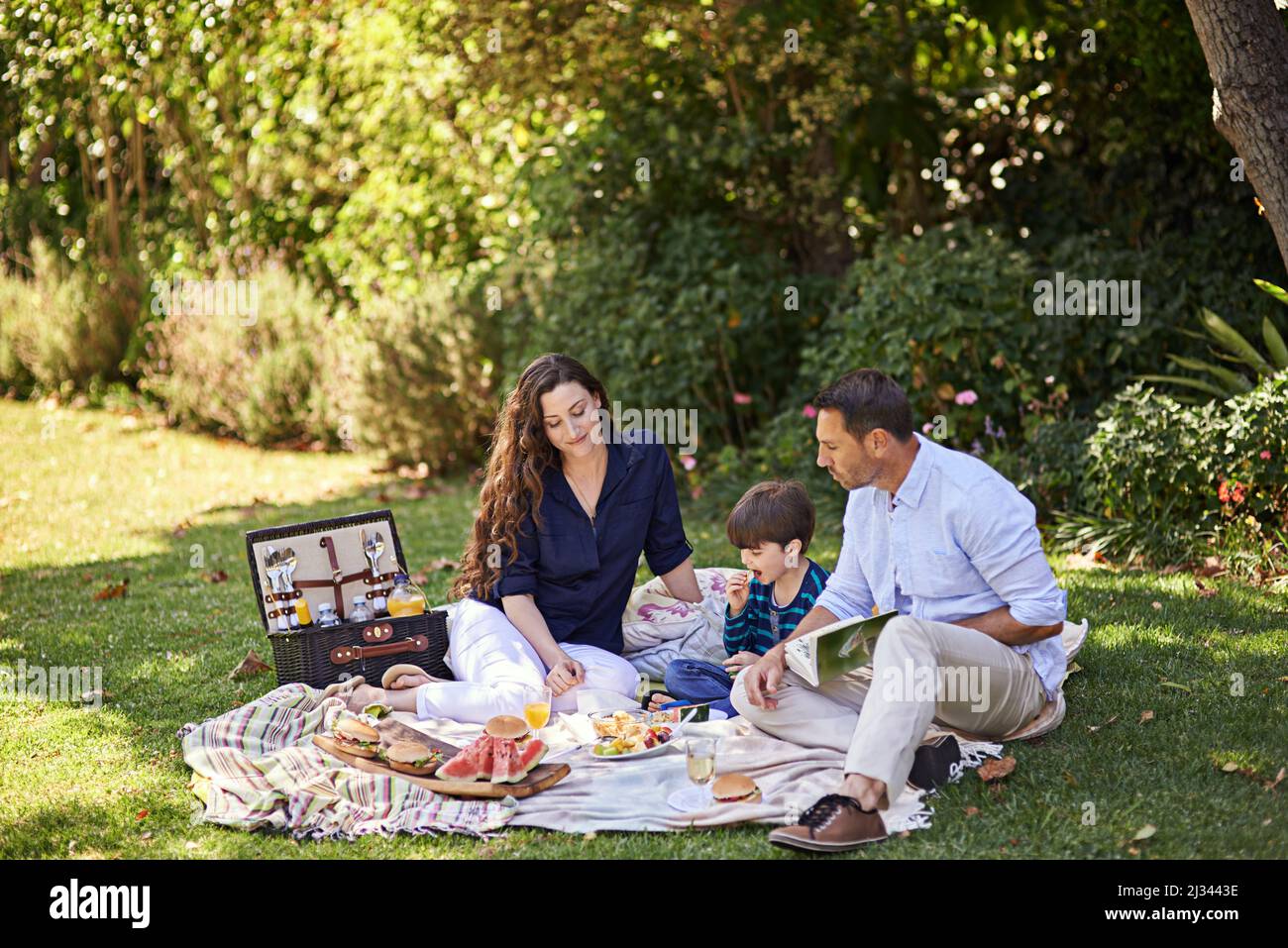 Family picnics are the best. Shot of a family enjoying a picnic together. Stock Photo