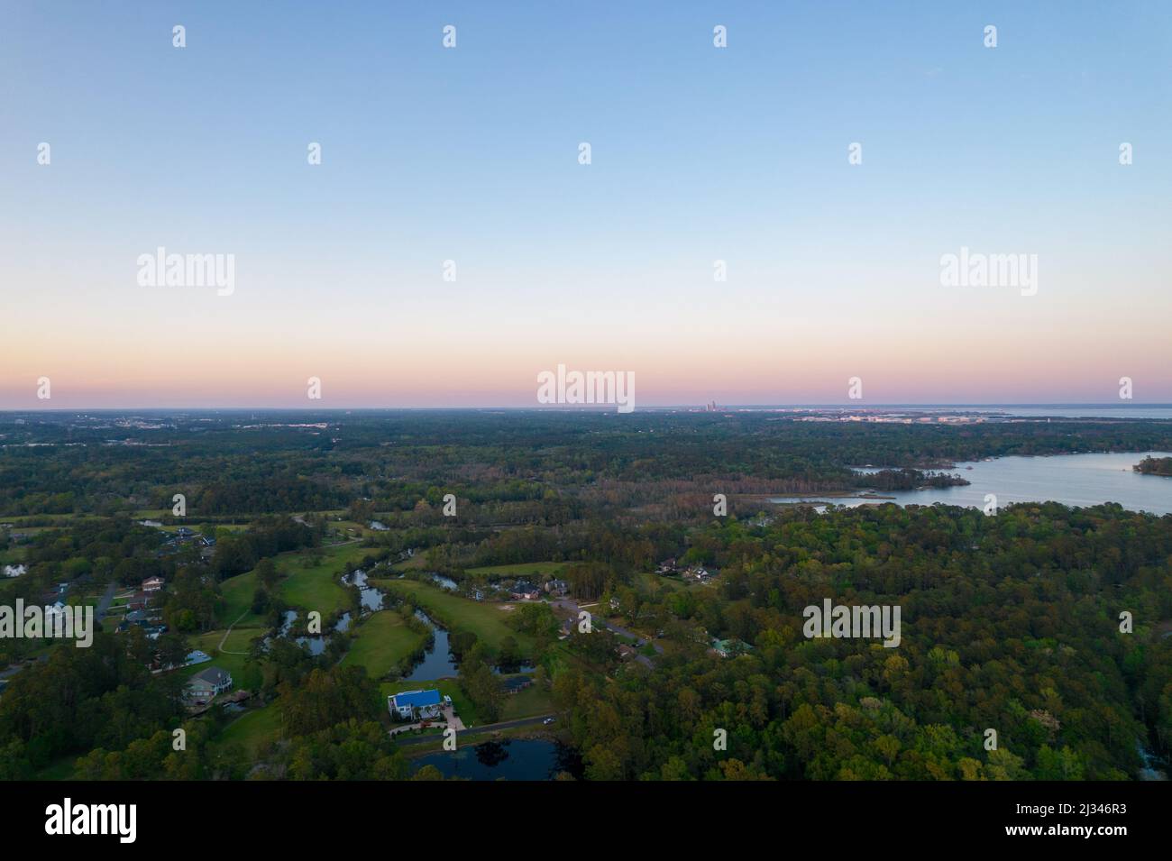 The downtown Mobile, Alabama skyline on the horizon from above Dog