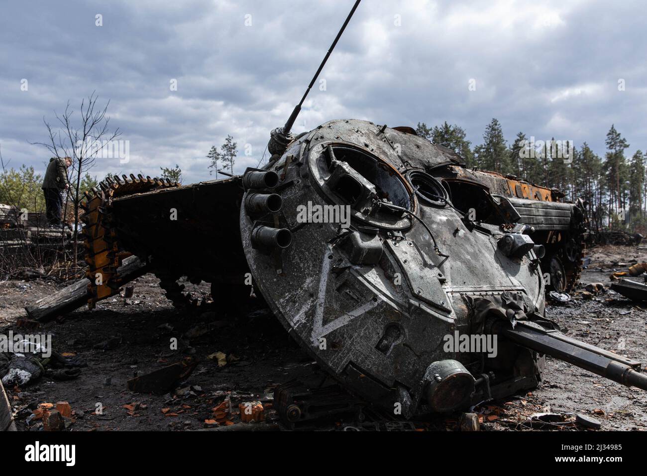 Dmytrivka, Ukraine. 04th Apr, 2022. A destroyed Russian tank with a white painting 'V' near the village in Dmytrivka, Zhytomyr region. Following the Ukrainian force's counter-attacks and retreating Russian forces, Iprin and Bucha and the surrounding cities and villages of Kyiv Oblast have been retaken by the Ukrainian forces. Credit: SOPA Images Limited/Alamy Live News Stock Photo