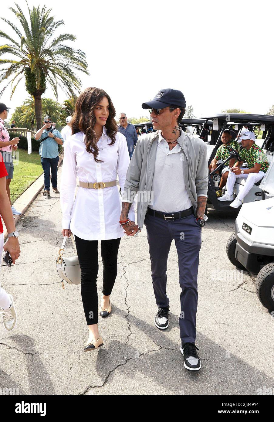 CORAL GABLES, FLORIDA - APRIL 05: MCF CO-Founder Marc Anthony and Madu  Nicola attend the 2022 Maestro Cares Foundation's Celebrity Golf Tournament  at Biltmore Hotel Miami-Coral Gables on April 05, 2022 in
