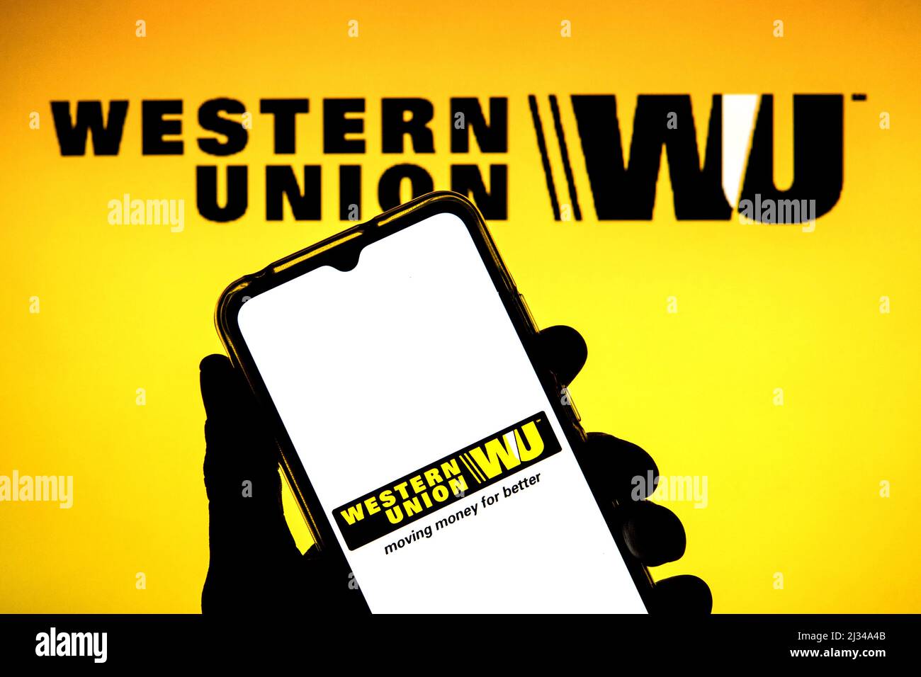 Spain. 04th Apr, 2022. In this photo illustration a Western Union Company  logo seen displayed on a smartphone with a Western Union Company logo in  the background. (Photo by Thiago Prudencio/SOPA Images/Sipa