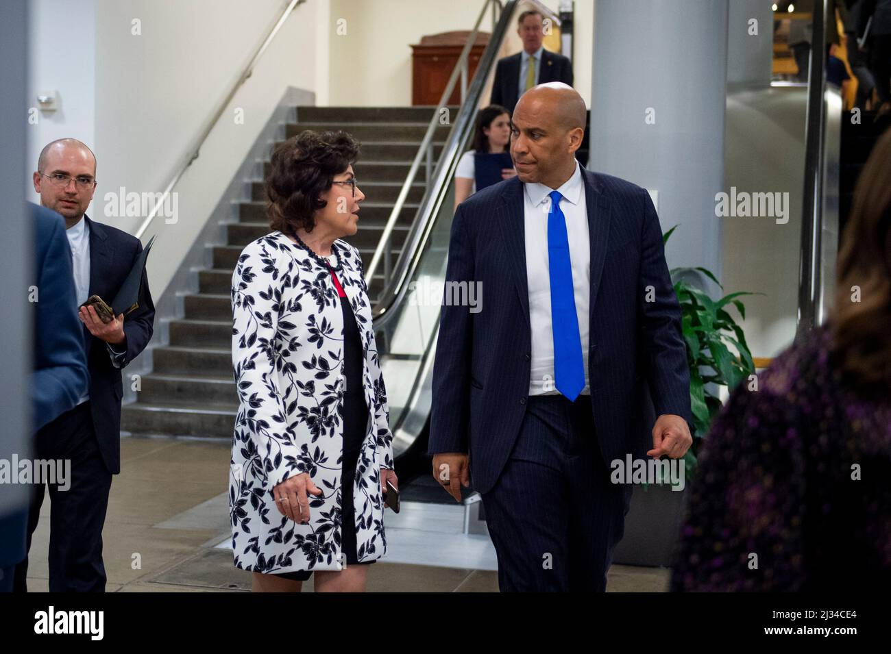 Washington, Vereinigte Staaten. 05th Apr, 2022. United States Senator Jacky Rosen (Democrat of Nevada), left, talks with United States Senator Cory Booker (Democrat of New Jersey) in the Senate subway at the US Capitol during a vote in Washington, DC, Tuesday, April 5, 2022. Credit: Rod Lamkey/CNP/dpa/Alamy Live News Stock Photo
