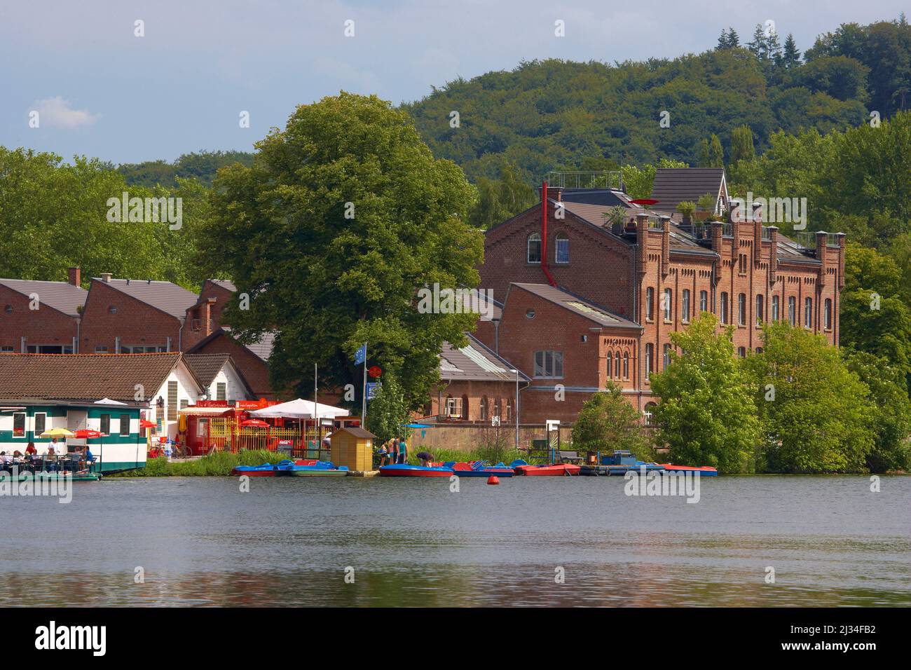 Ruhr (Kettwiger reservoir) with boats, pubs and former Scheidtscher cloth factory, Essen-Kettwig, Ruhr area, North Rhine-Westphalia, Germany, Europe Stock Photo