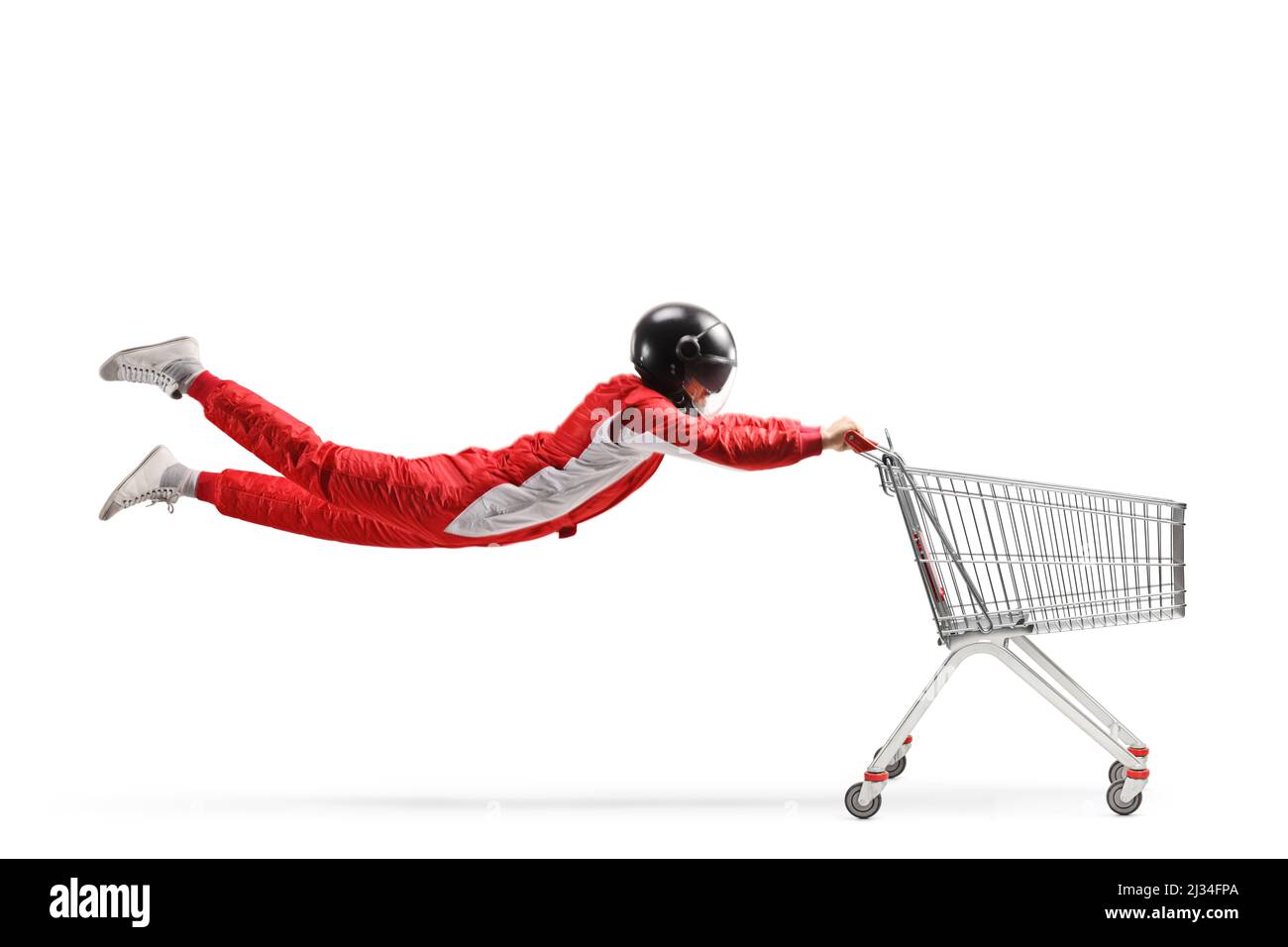 Car racer flying and holding a shopping cart isolated on white background Stock Photo