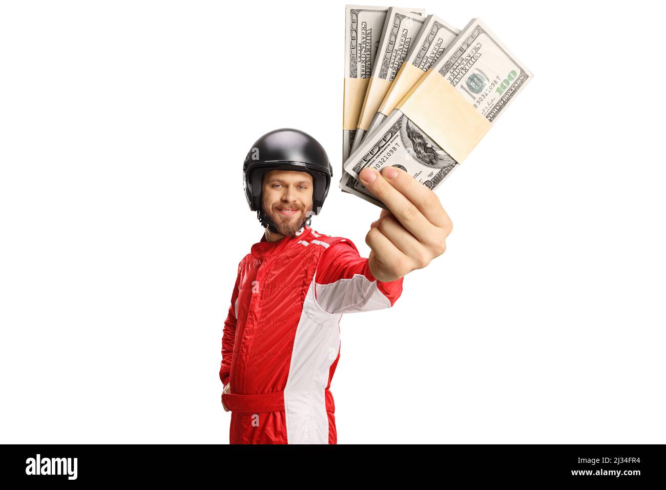 Racer holding stacks of money and smiling isolated on white background Stock Photo