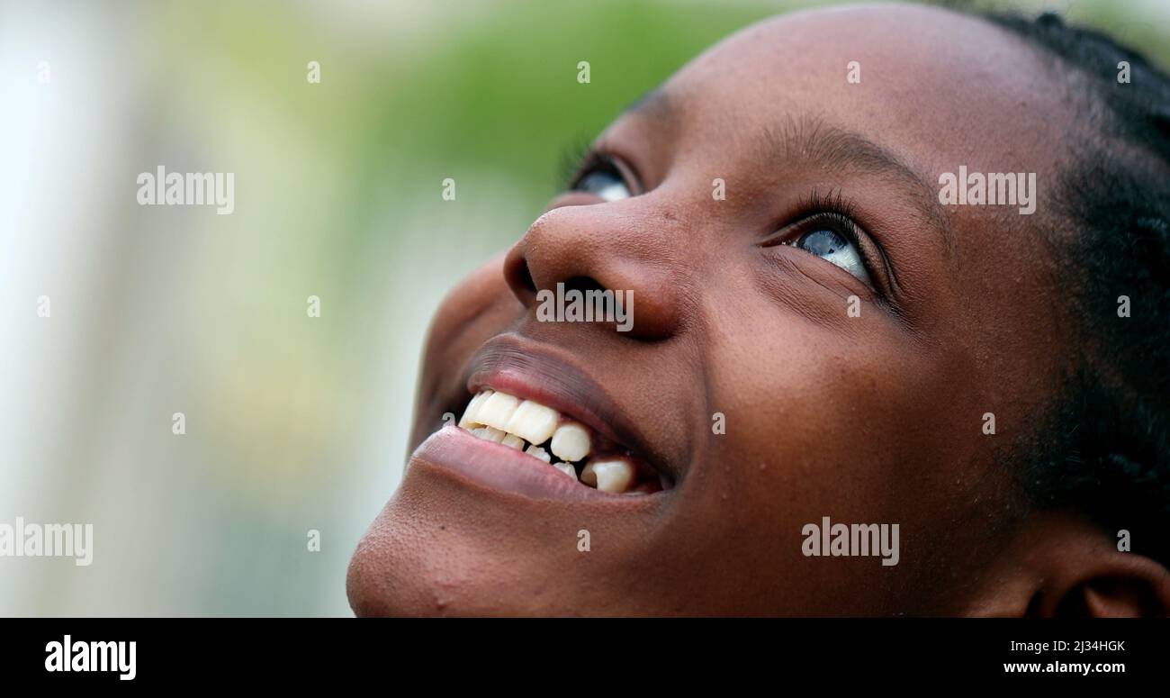 Black teen girl opening eyes hi-res stock photography and images - Alamy