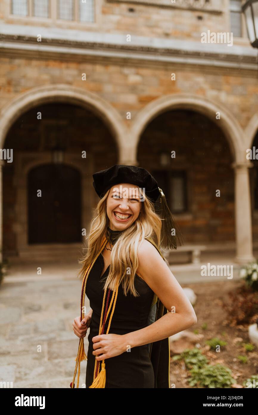 cap and gown graduation photos at a university Stock Photo - Alamy