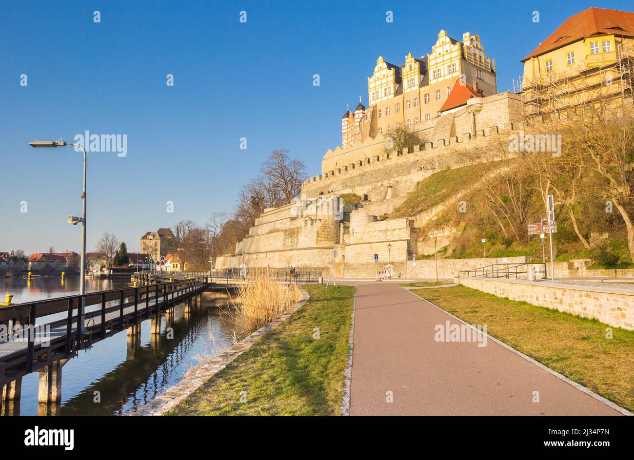 Jetty and bicycle path at the riverside in Bernburg, Germany Stock ...