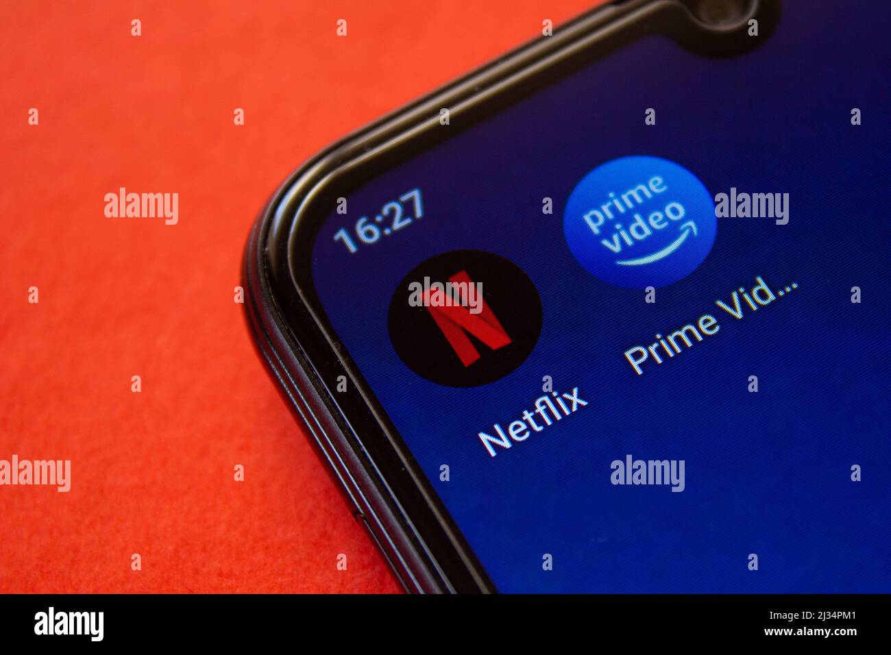 Netflix and Amazon Prime Video android applications icon on smartphone screen. Afyonkarahisar, Turkey - April 4, 2022. Stock Photo