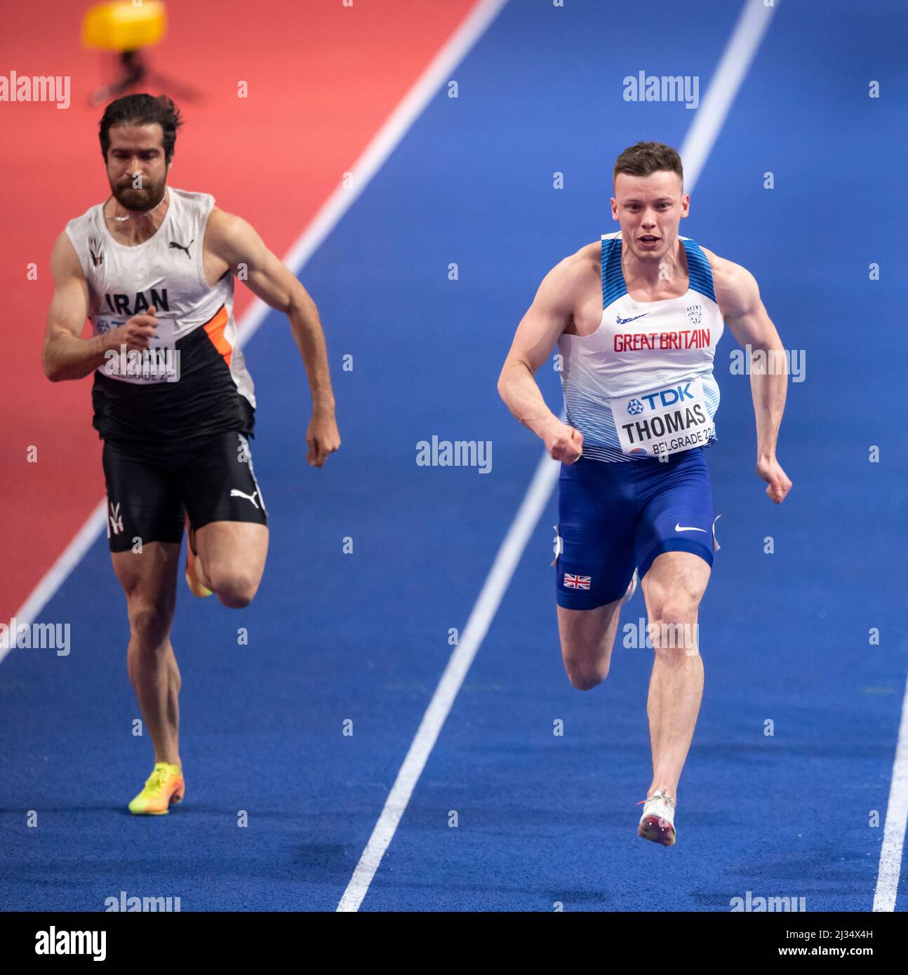 Hassan Taftian and Adam Thomas competing in the men’s 60m heats on Day