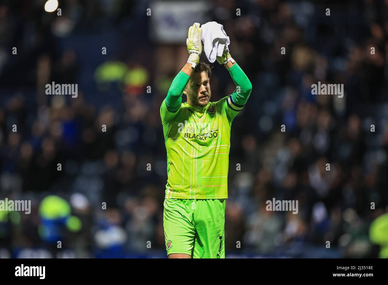 Chris Maxwell #1 of Blackpool applauds the traveling fans Stock Photo ...