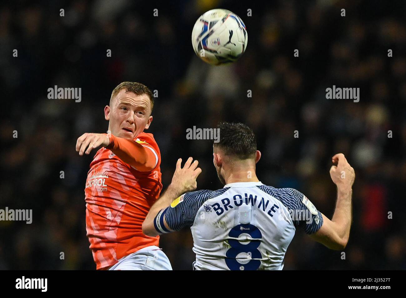Shayne Lavery 19 of Blackpool wins the header Stock Photo Alamy