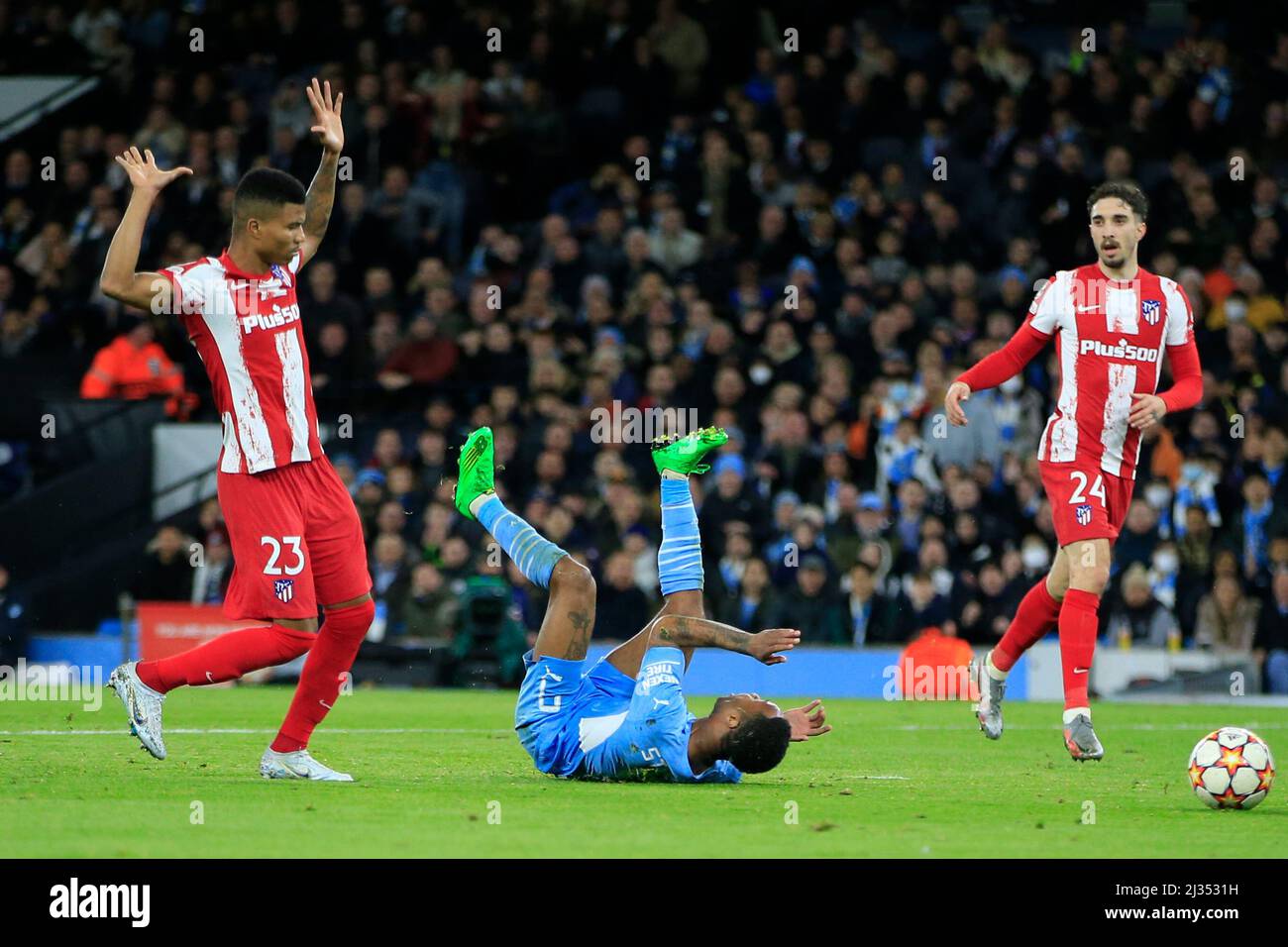 Manchester, UK. 05th Apr, 2022. Raheem Sterling #7 of Manchester City falls in the penalty area after a challenge by Reinildo Mandava #23 of Athletico Madrid but no penalty is given in Manchester, United Kingdom on 4/5/2022. (Photo by Conor Molloy/News Images/Sipa USA) Credit: Sipa USA/Alamy Live News Stock Photo